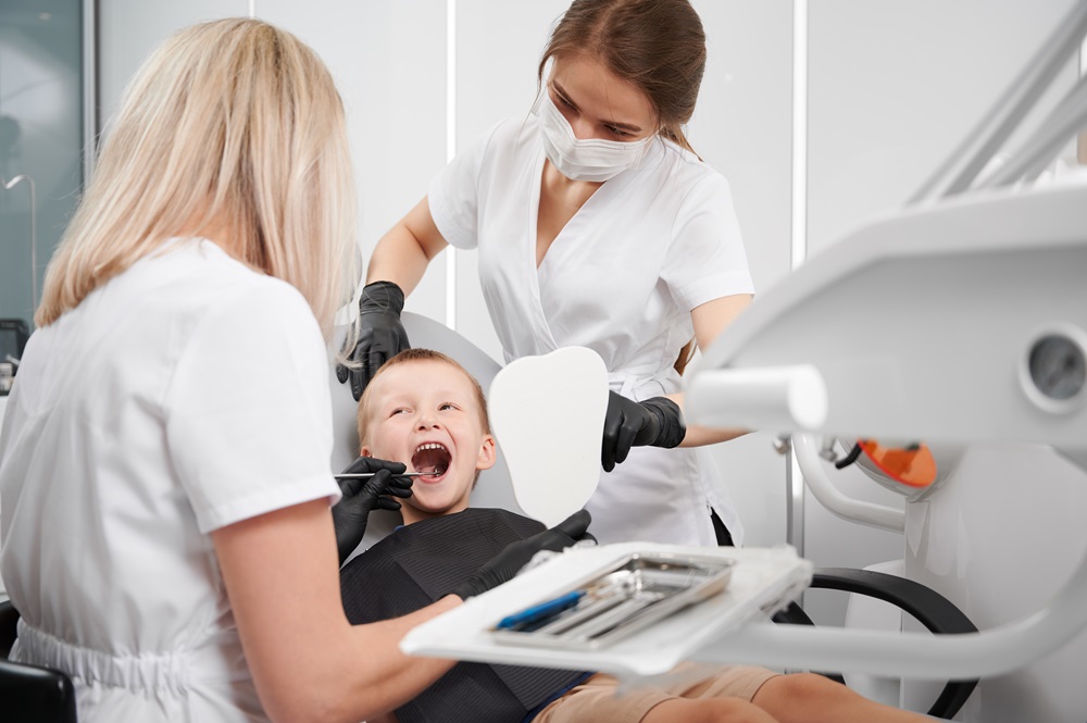 dentist explaining about pediatric dentistry