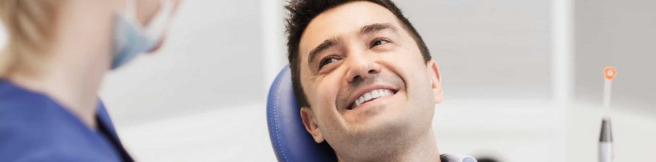 The Pros and Cons of Dental Implants Versus Bridges