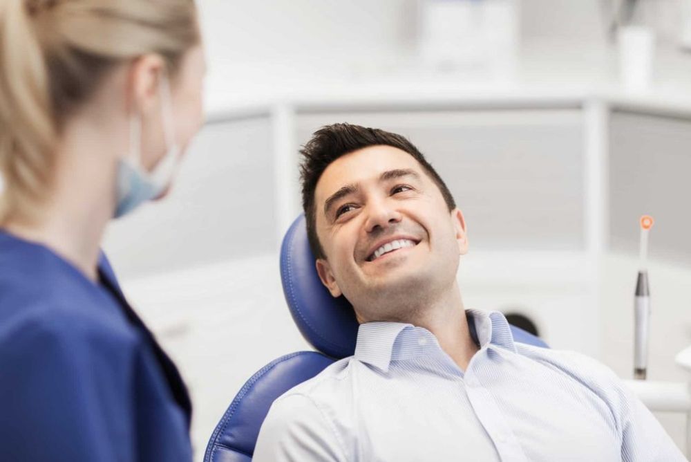 The Pros and Cons of Dental Implants Versus Bridges