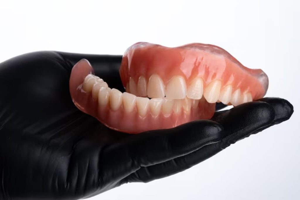 full dentures designed to restore missing teeth and improve smile function